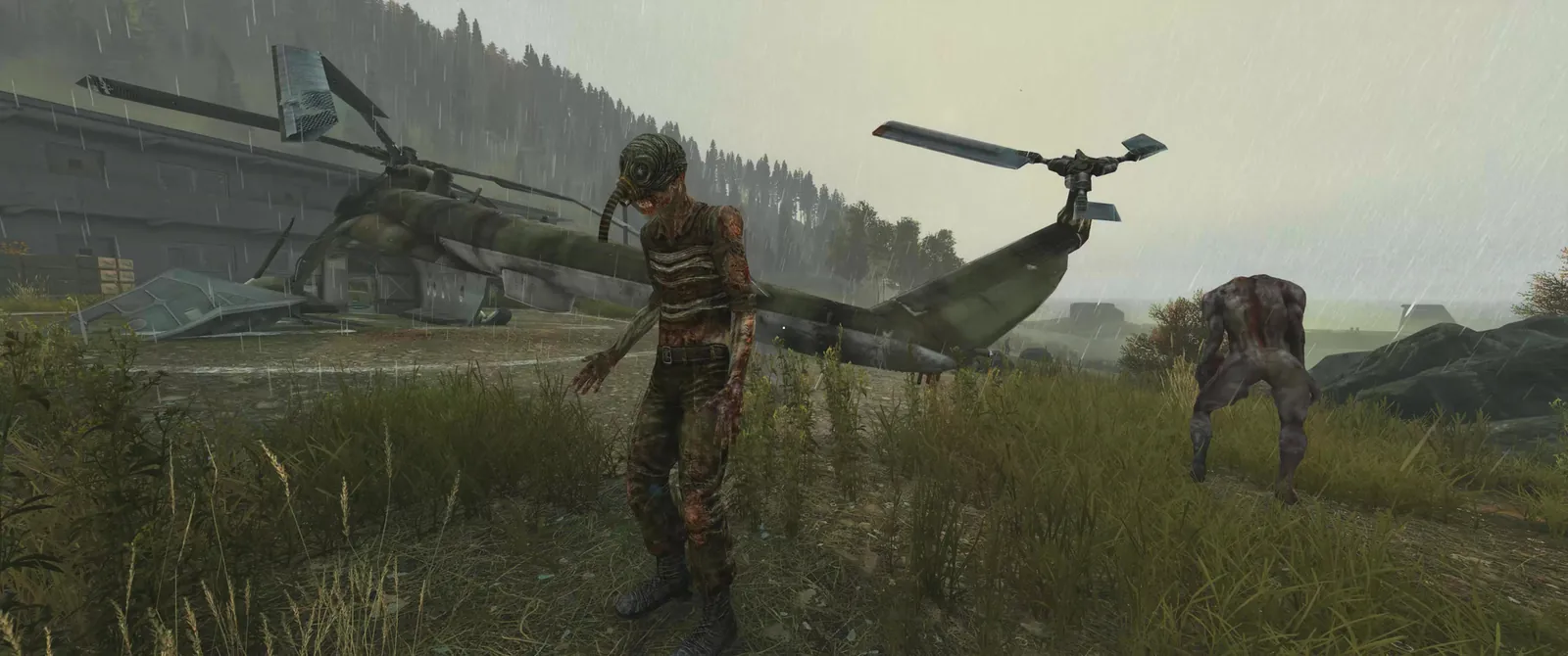 Two mutated infected stalking through the gas zone at Berezhki on Chernarus, beside a crashed helicopter