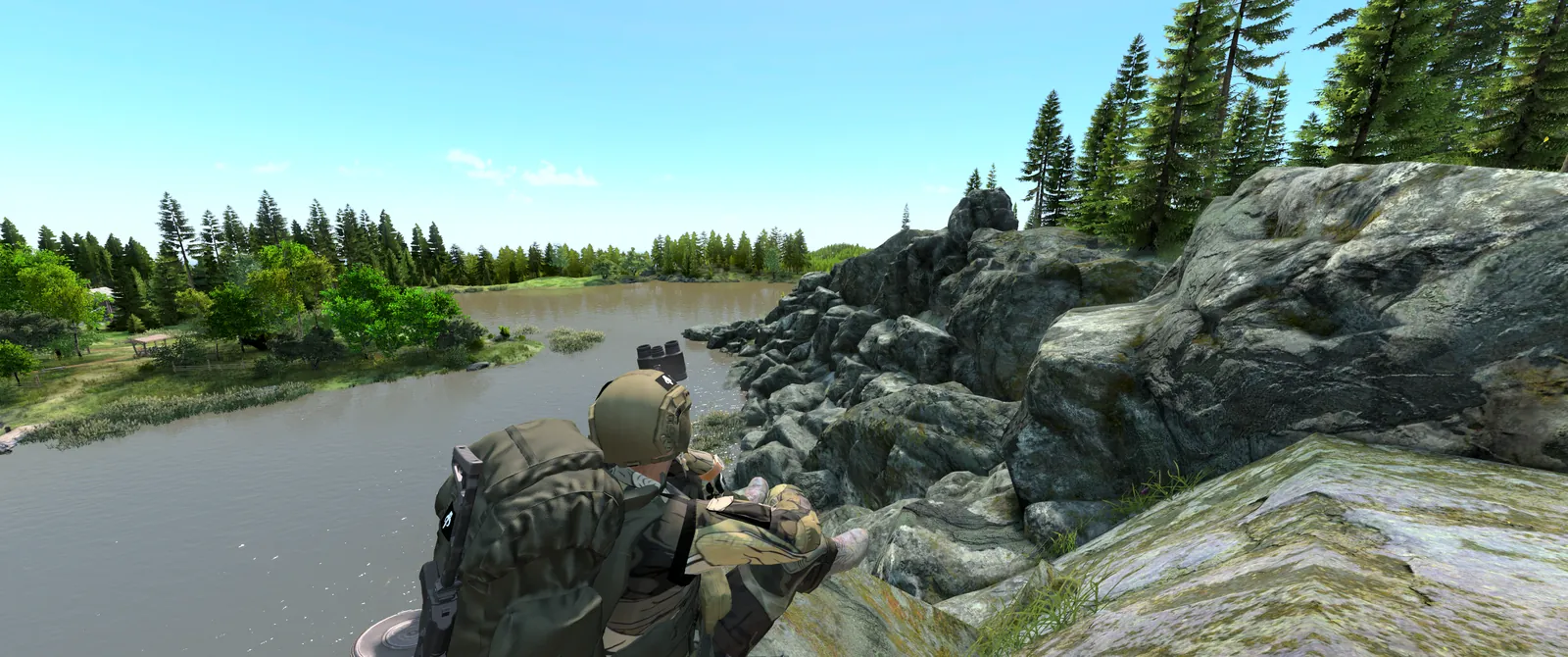 A geared-up survivor crouched on the rocks above a river lined with trees