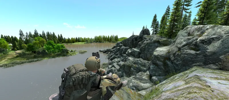 A survivor watching the river from the rocks on Chernarus